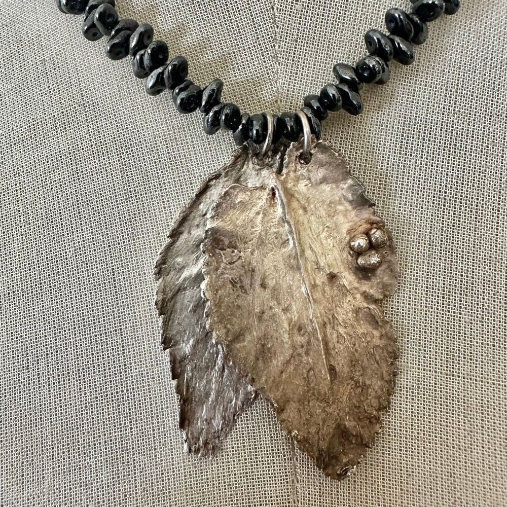 Artisan Hematite Bead Necklace with Electroplated Leaf Pendant - Picture 2 of 13